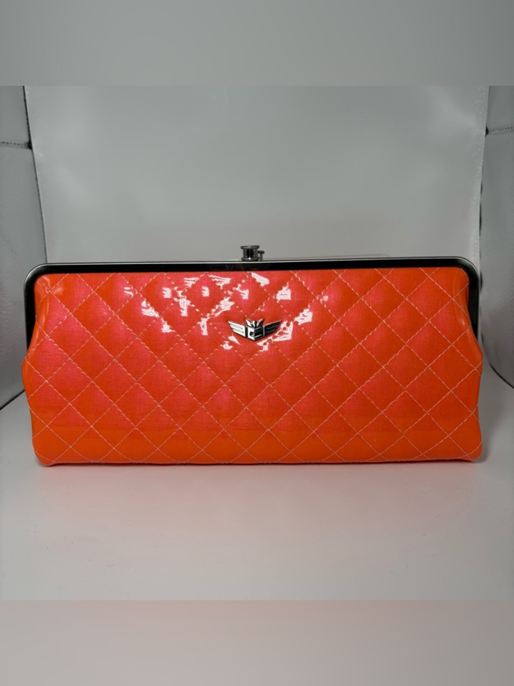 Women’s Quilted Orange Patent Frame Clutch